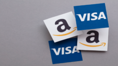 Amazon acknowledges Visa cards in worldwide truce against charges
