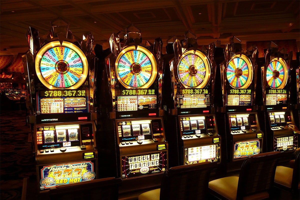 A row of traditional slot machines