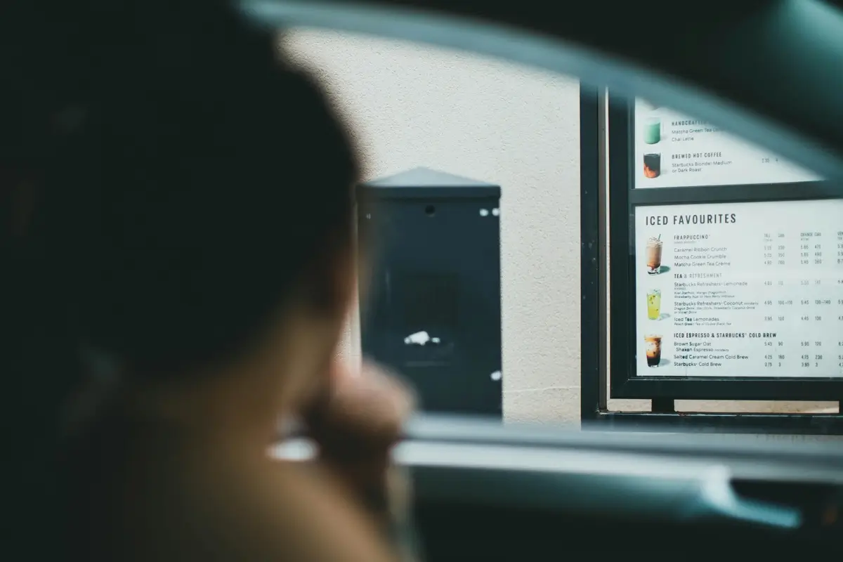 Why Outdoor Drive Thru Boards Require a Different Design Standard Than Indoor Displays